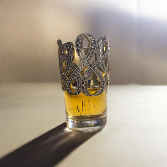 Dalal by Lattafa 100ml - elegant bottle with ornate silver crown cap on white background